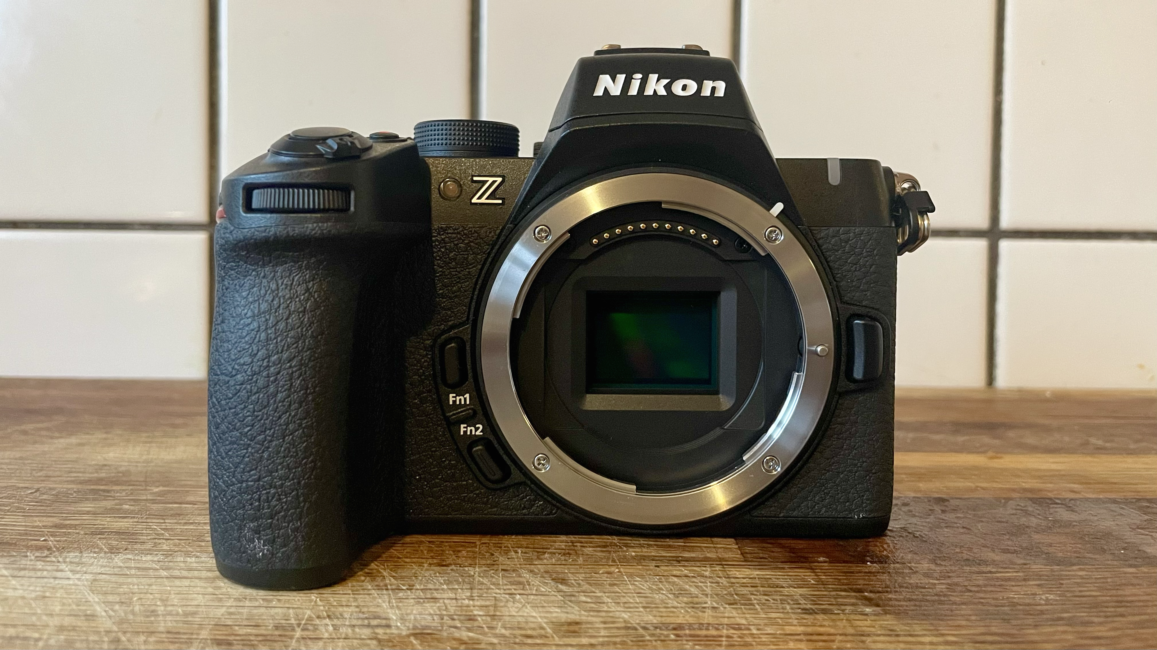 Nikon Z50 II mirrorless camera on a wooden tabletop