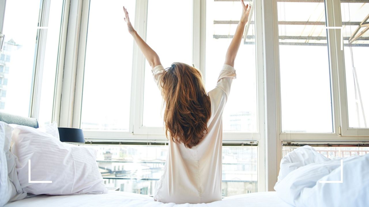 Woman stretching after waking up