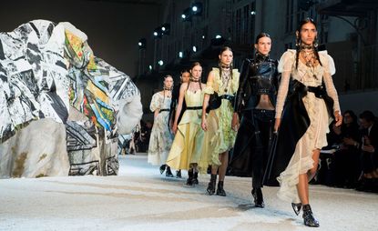 Models wear white dress, leather jacket and black skirt, and yellow dresses