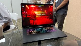 MSI Crosshair 18 HX gaming laptop with an RTX 5070, being benchmarked at Computex in Taipei.