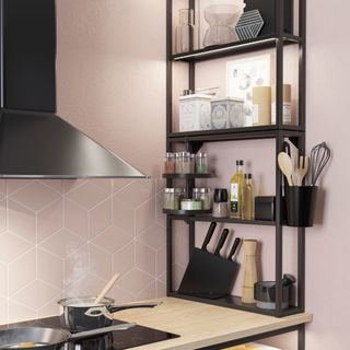kitchen with black enhet shelving unit and cabinet and pink wall and tiles