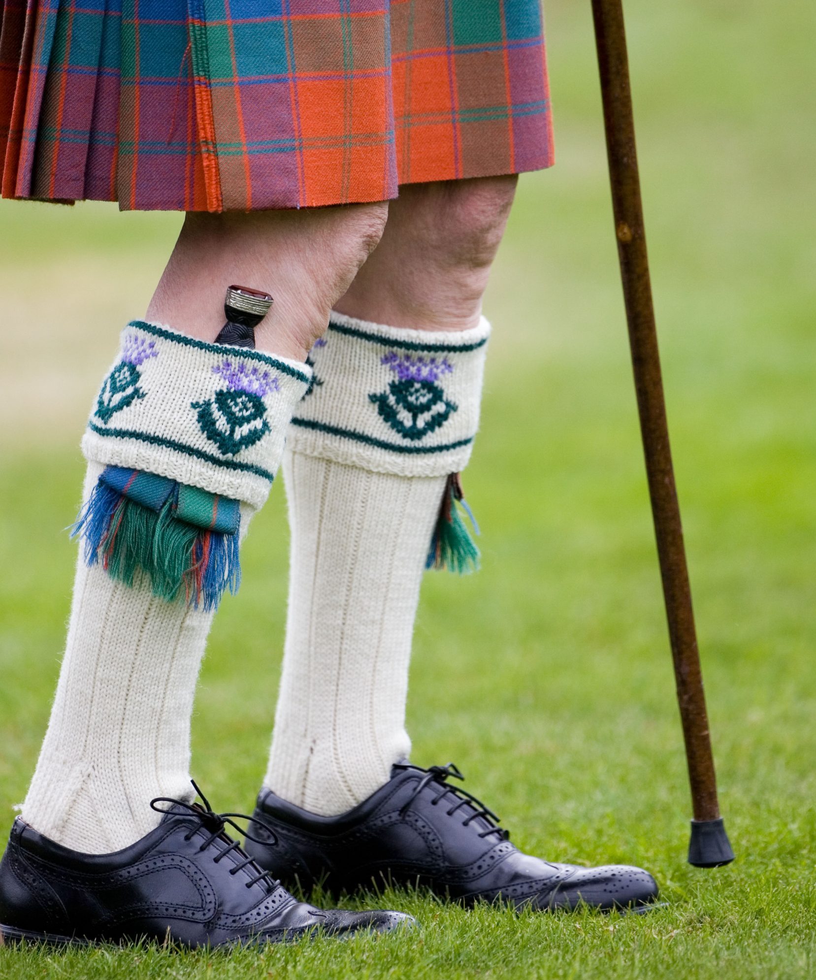 A dirk tucked into a man&#039;s sock is a common sight at events such as the Braemar Games Highland Gathering.