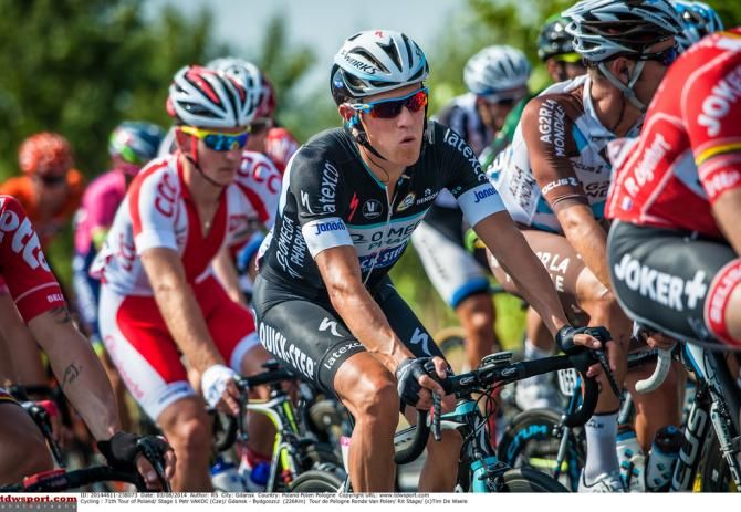 Petr Vakoč sitting in the peloton before launching the winning attack