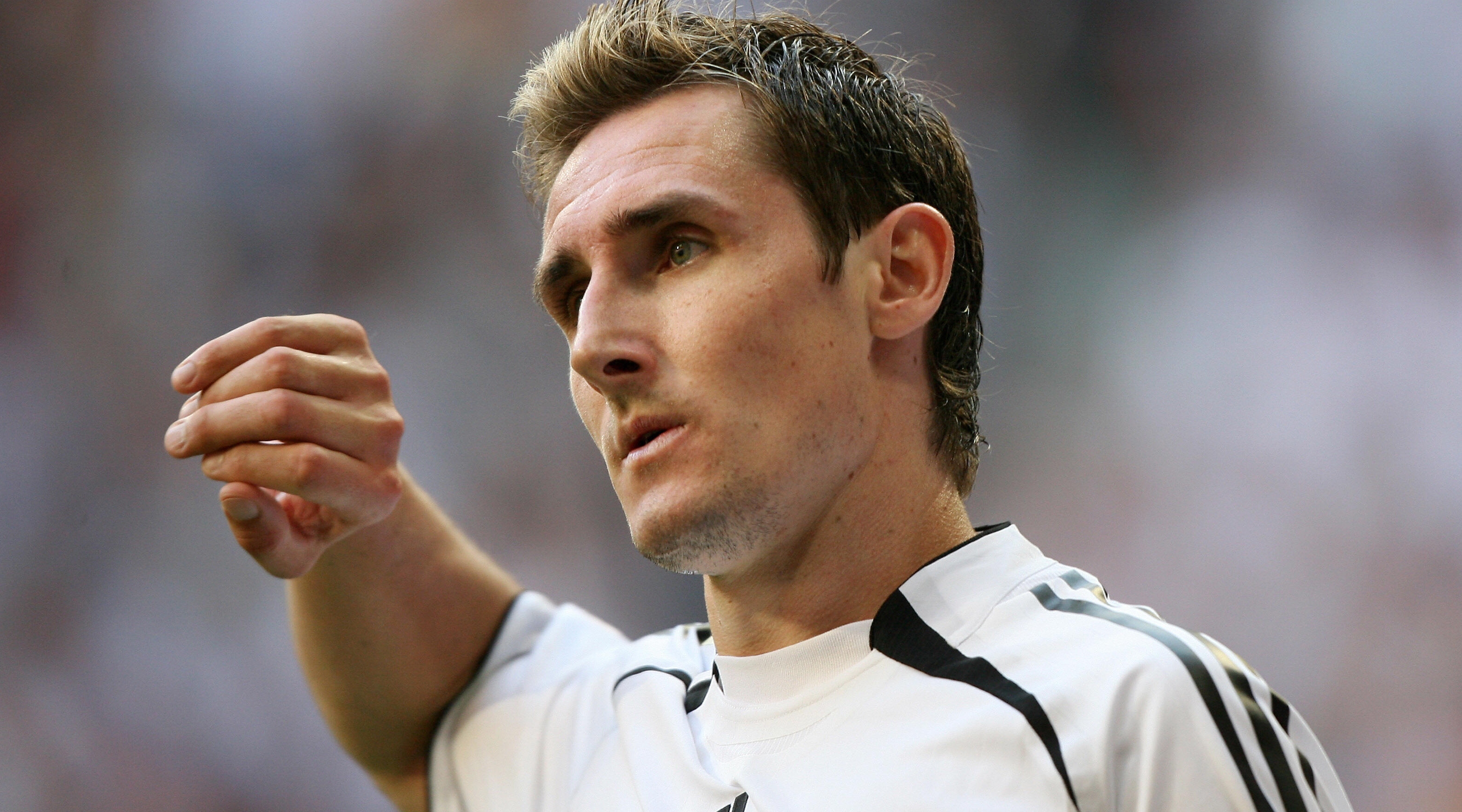 Munich, GERMANY: German forward Miroslav Klose gestures after scoring against Costa Rica during their opening match at Munich's World Cup Stadium in football's 2006 World Cup, 09 June 2006. Germany were leading 3-2 in the second half. AFP PHOTO / VALERY HACHE (Photo credit should read VALERY HACHE/AFP via Getty Images)