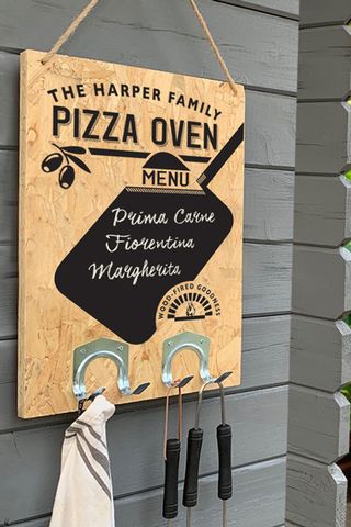 personalised chalk board menu for hanging in an outdoor kitchen