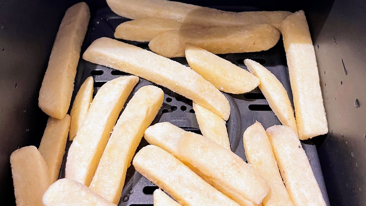 Ninja DZ550 Foodi 6-in-1 10-qt. XL 2-Basket Air Fryer being tested in writer's kitchen