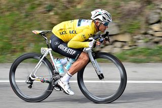 Michal Kwiatkowski (Etixx-QuickStep) is in a tuck position on a descent