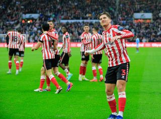 Dennis Cirkin of Sunderland celebrates after scoring his team's second goal during the Sky Bet Championship match between Sunderland AFC and Coventry City FC at Stadium of Light on November 9, 2024 in Sunderland, England.