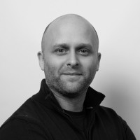 A headshot of Marc Overson