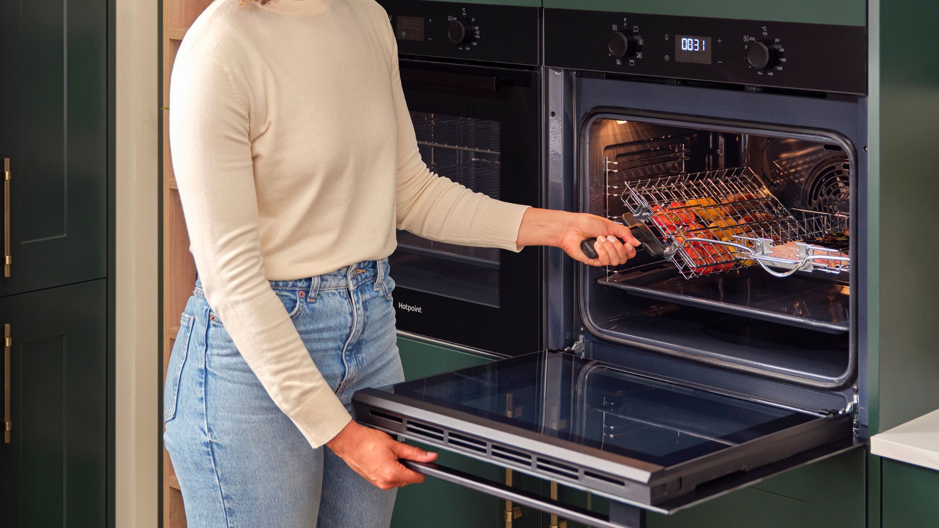 The AO Hotpoint kitchen being used in a family setting