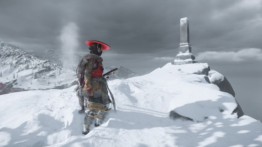 Atsu standing in front of a Pillar of the Fallen on a snowy outcropping