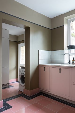 a utility room leading from a kitchen