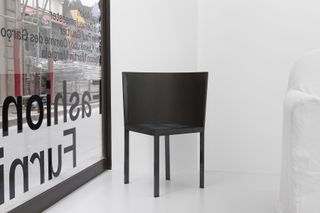 Black chair by Comme