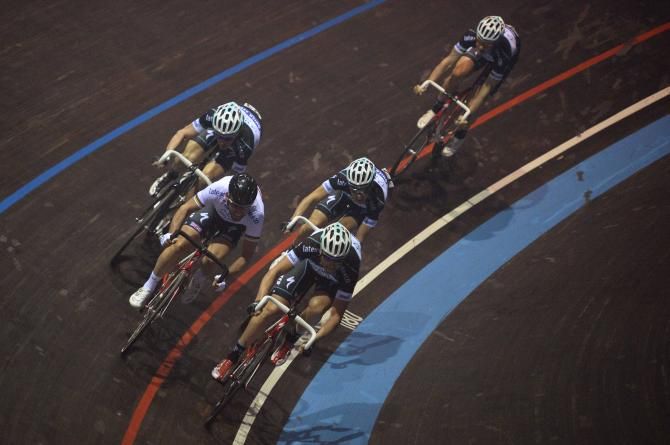 Mark Cavendish surrounded by teamates