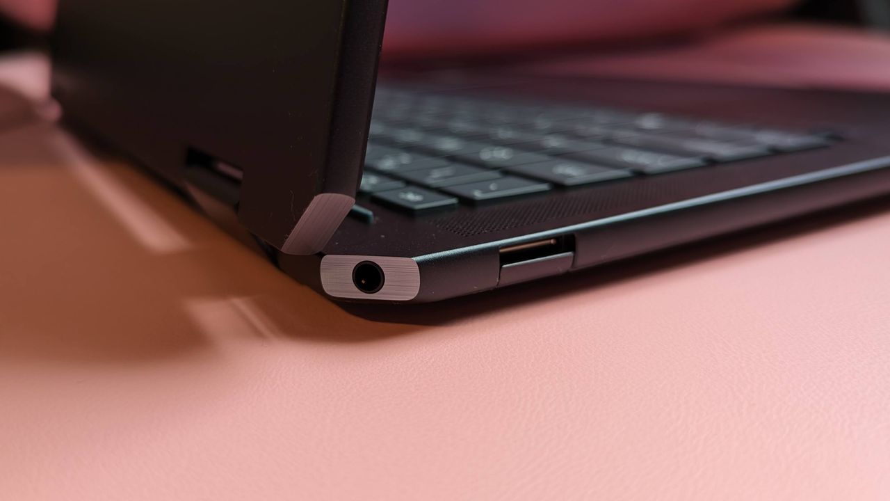 Sideview photo of HP Spectre x360 14 2024 to show angled port and overall thickness