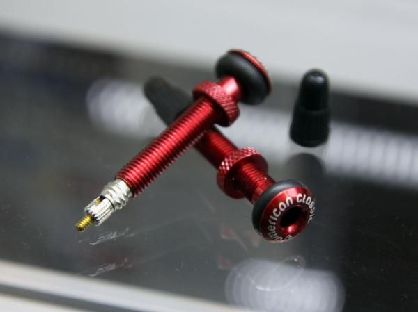 American Classic's own aluminum tubeless valve stems sport a red anodized finish and removable cores to easily add sealant.