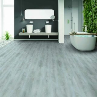 grey wooden effect luxury vinyl flooring in bathroom