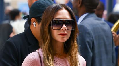 Victoria Beckham wearing pencil skirt on September 29, 2025 in Paris, France