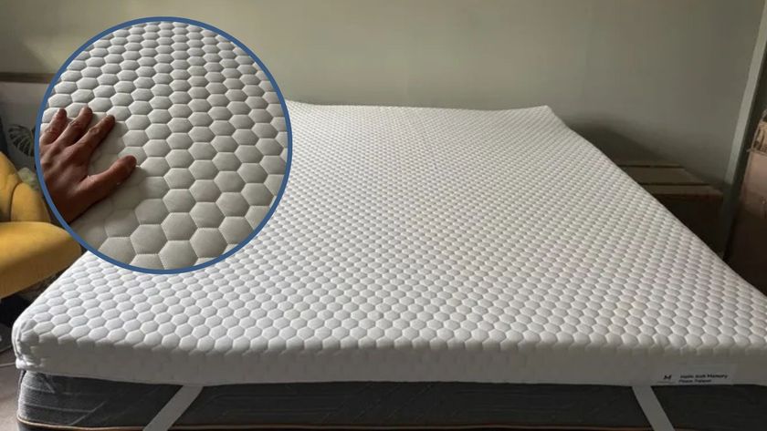 The Helix Premium Mattress Topper with GlacioTex in a tester's bedroom. On the top left foreground, there is a circular frame containing a close-up image of a hand feeling the GlacioTex cover. 
