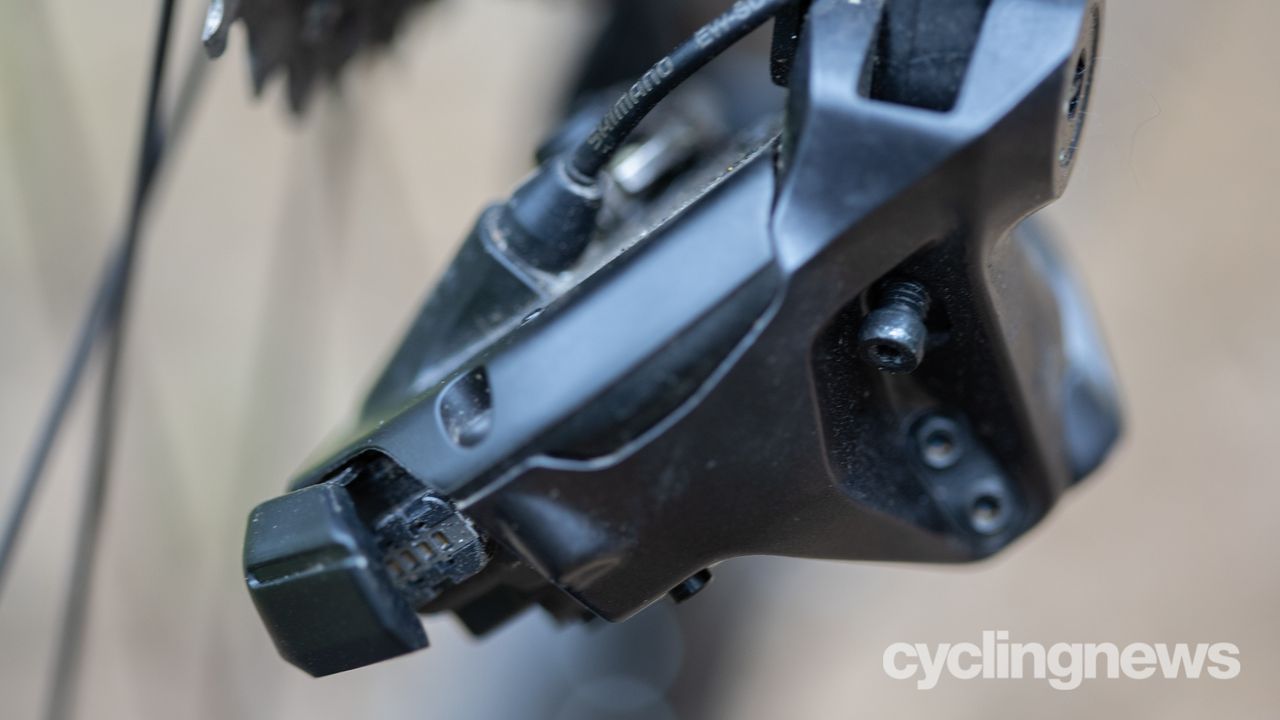 Shimano Ultegra R8100 groupset detail of rear derailleur showing charging port