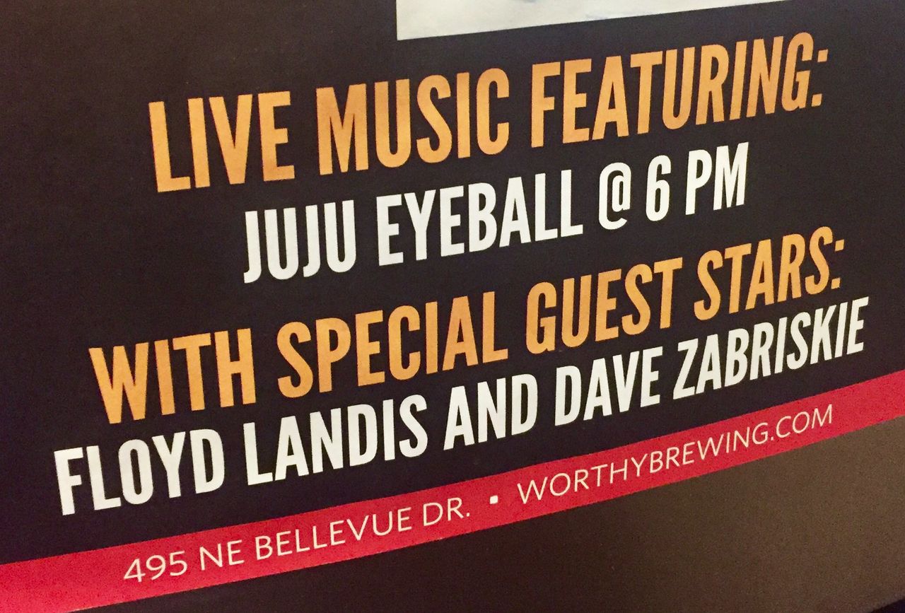 A poster at Worthy Brewing advertises an appearance by Landis and Zabriske