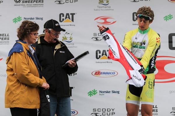 Talbot pulls on the most aggressive rider jersey after his efforts in the day's escape