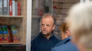 Alan (Toby Jones) serving a customer in Mr Bates vs The Post Office episode 1