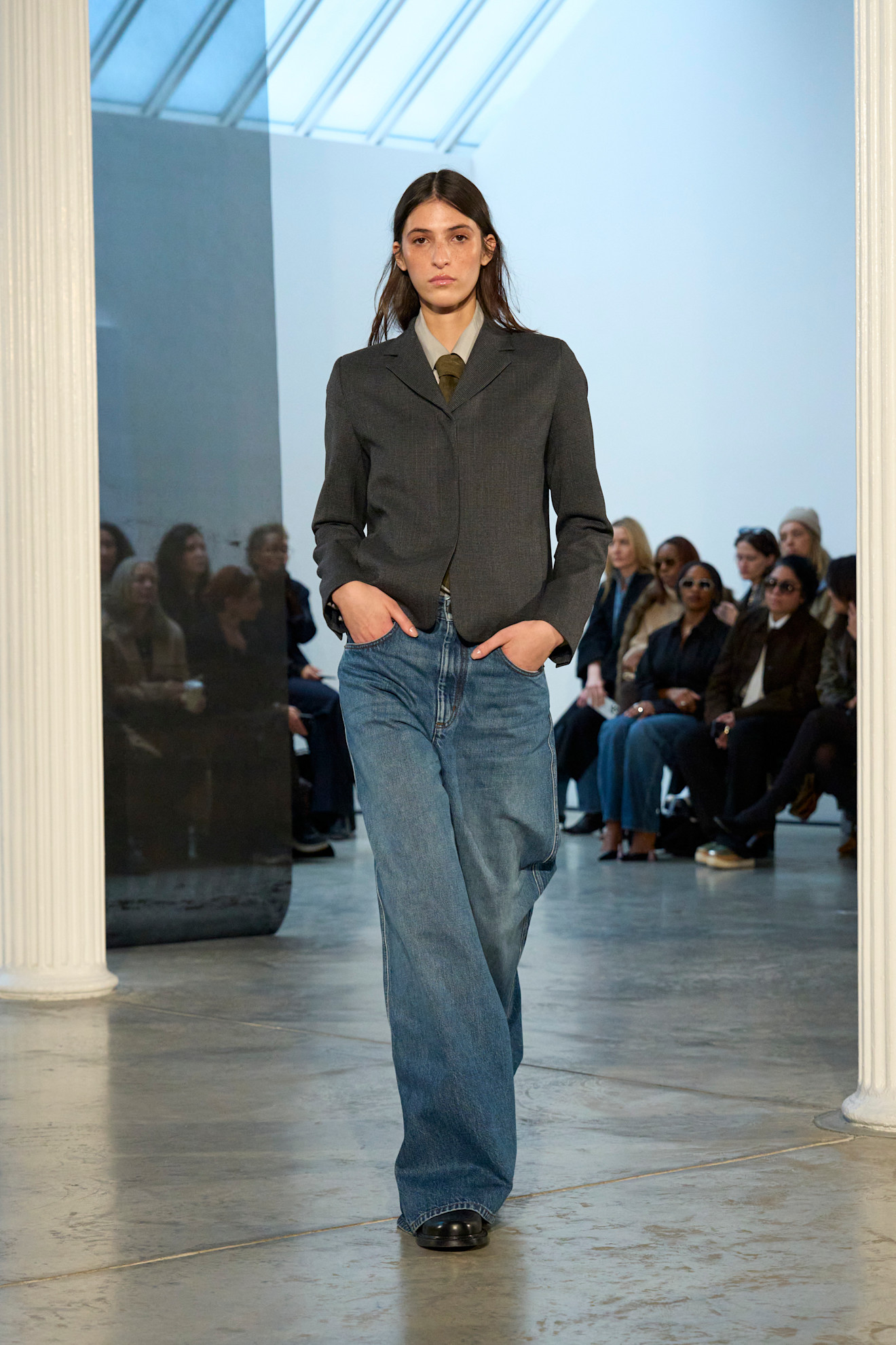 Woman in wide-leg jeans.