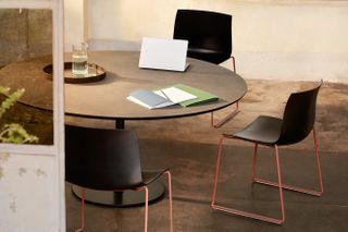 Milan Design Week Arper Cartifa Carta black chairs with red metal legs