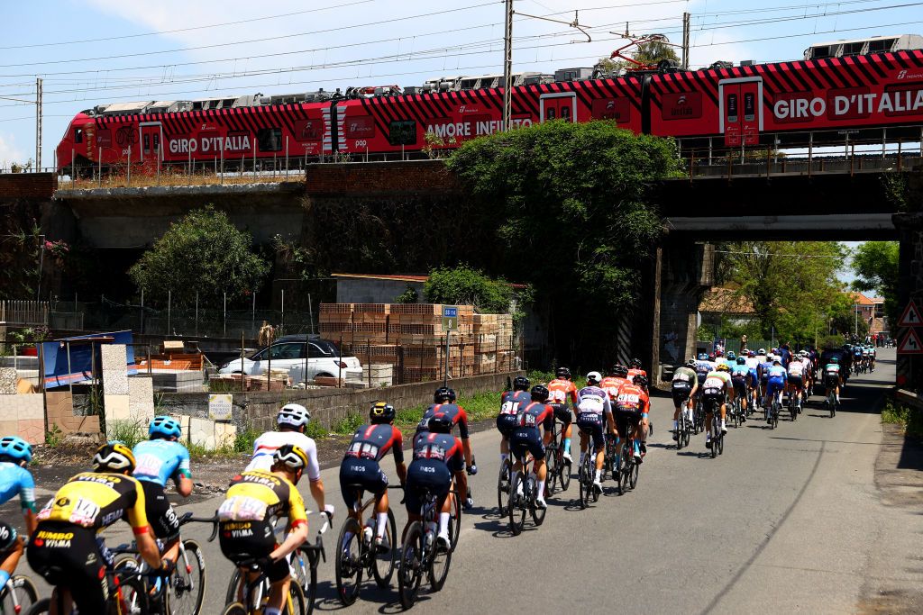MESSINA ITALY MAY 11 A general view of the peloton passing through Fiumefreddo di Sicilia village landscape during the 105th Giro dItalia 2022 Stage 5 a 174km stage from Catania to Messina Giro WorldTour on May 11 2022 in Messina Italy Photo by Michael SteeleGetty Images