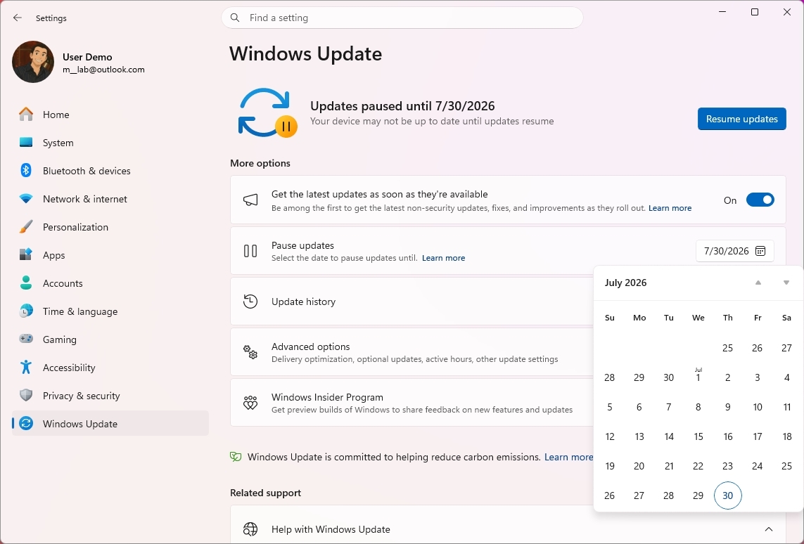 Windows 11 Settings showing the Windows Update settings page with the new calendar-based pause feature.