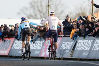 HOOGERHEIDE Mathieu van der Poel celebrates his victory with Wout van Aert L during the Cyclocross World Championships in North Brabant ANP BAS CZERWINSKI Photo by ANP via Getty Images