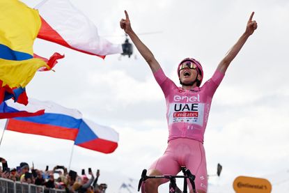 LIVIGNO MOTTOLINO ITALY MAY 19 Tadej Pogacar of Slovenia and UAE Team Emirates Pink Leader Jersey celebrates at finish line as stage winner during the 107th Giro dItalia 2024 Stage 15 a 222km stage from Manerba del Garda to Livigno Mottolino 2387m UCIWT on May 19 2024 in Livigno Mottolino Italy Photo by Tim de WaeleGetty Images