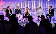 From left, moderator Clay Chandler, Gadi Amit, Natasha Jen, Ernesto Quinteros, and Harry West take part in a panel discussion at the Brainstorm Design conference in Singapore on Mar. 7, 2018. 
