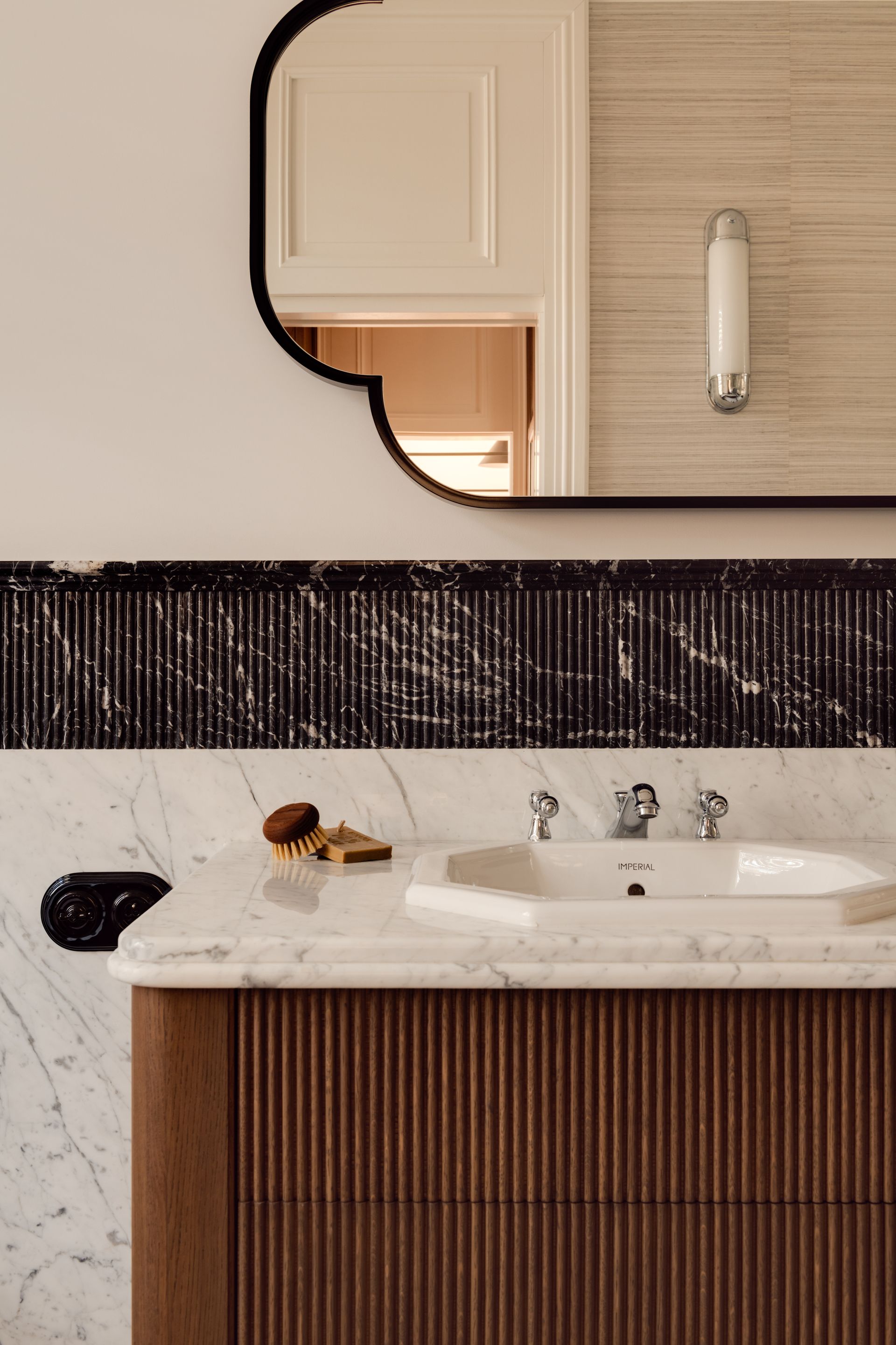 A bathroom with a storage cabinet