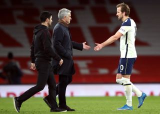 Tottenham Hotspur manager Jose Mourinho greets Tottenham Hotspur’s Harry Kane after the final whistle during the Premier League match at Emirates Stadium, London. Picture date: Sunday March 14, 2021
