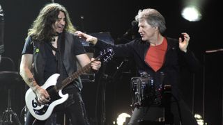 Phil X (L) and Jon Bon Jovi perform during Bon Jovi's "This House is Not For Sale" tour at Toyota Center on March 23, 2018 in Houston, Texas