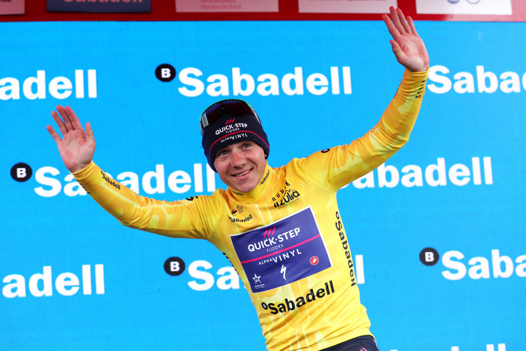 MALLABIA SPAIN APRIL 08 Remco Evenepoel of Belgium and Team QuickStep Alpha Vinyl celebrates at podium as Yellow Leader Jersey winner during the 61st Itzulia Basque Country 2022 Stage 5 a 1638km stage from Zamudio to Mallabia 305m itzulia WorldTour on April 08 2022 in Mallabia Spain Photo by Gonzalo Arroyo MorenoGetty Images