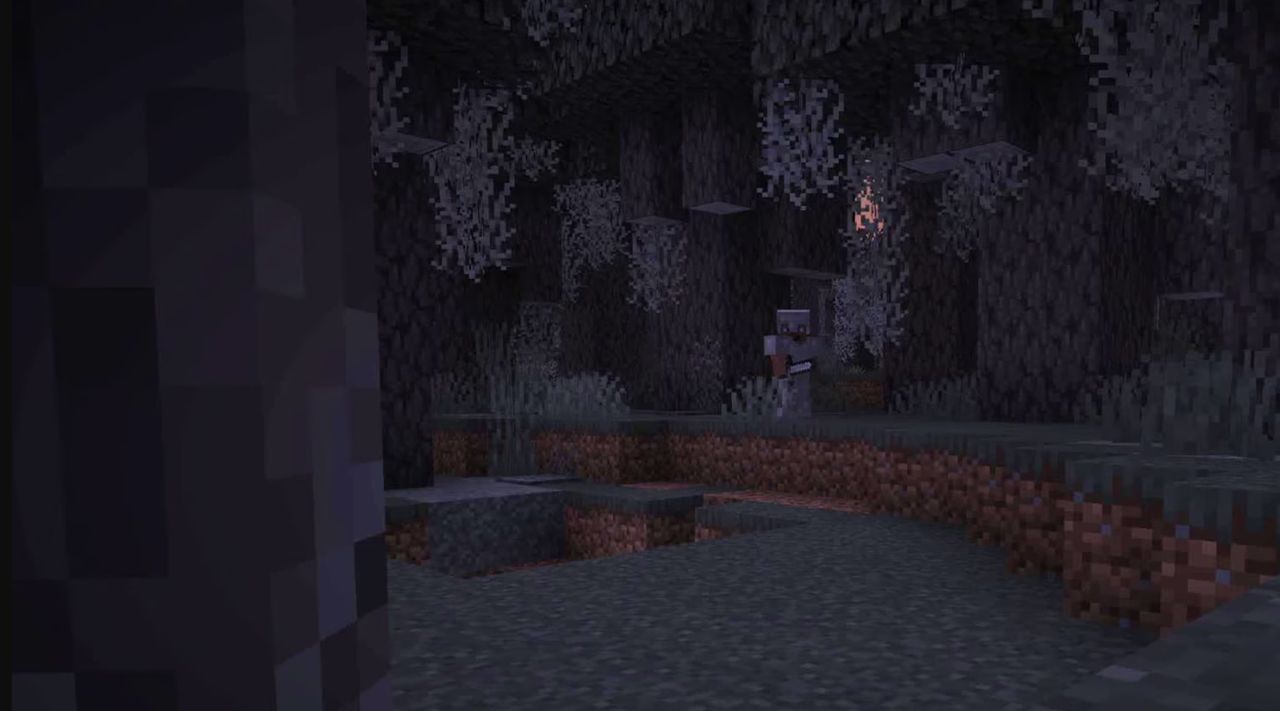 Nighttime view of new Pale Garden biome coming to minecraft, a greyish, desaturated forest