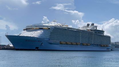 The Royal Caribbean cruise ship, Symphony of the Seas, is seen moored in the Port of Miami on August 1, 2021.