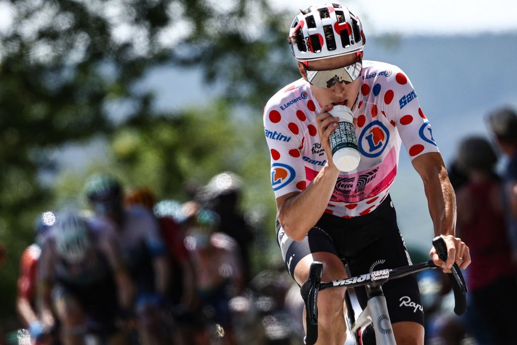 EF Education Easyposts US rider Neilson Powless wearing the best climbers polka dot dotted jersey cycles in a breakaway during the 9th stage of the 110th edition of the Tour de France cycling race 1825 km between SaintLeonarddeNoblat and Puy de Dome in central France on July 9 2023 Photo by AnneChristine POUJOULAT AFP Photo by ANNECHRISTINE POUJOULATAFP via Getty Images