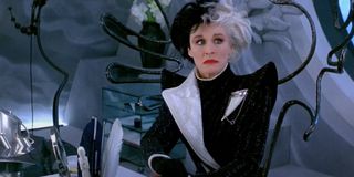 Glenn Close wears a black and white high dress with pointed shoulders in 101 Dalmatians.