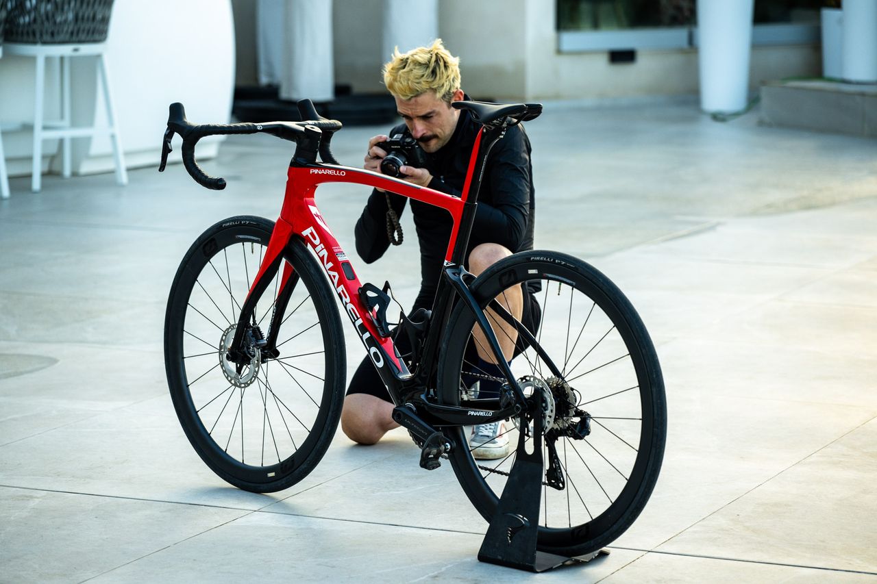 A red and black pinarello F road bike