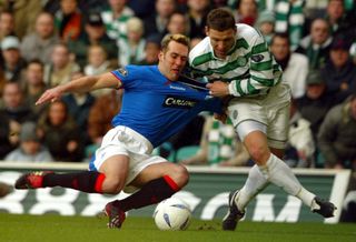 Fernando Ricksen battles for possession with Celtic’s Alan Thompson during his playing days