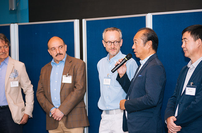 Chair, Vice-chair and co-chairs address the other judges