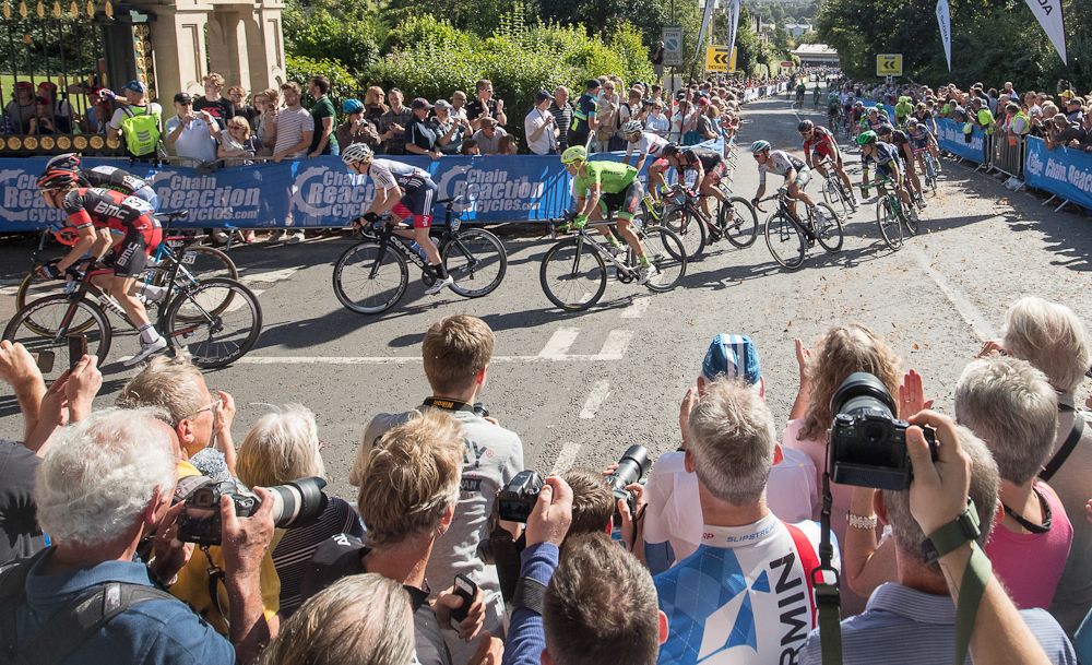The peloton rounds the final corner at the Tour of Britain