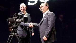 John Studdert, vice president, U.S. sales and marketing, Sony Electronics, and Hiroshi Kiriyama, vice president, media business, Professional Solutions and Services Group, Sony Corp., hold the new HDC-5500 multiformat live camera.