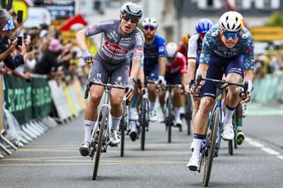 Tour de France 2024 stage 13: Wout van Aert (R) finishes second to Jasper Philipsen (L)
