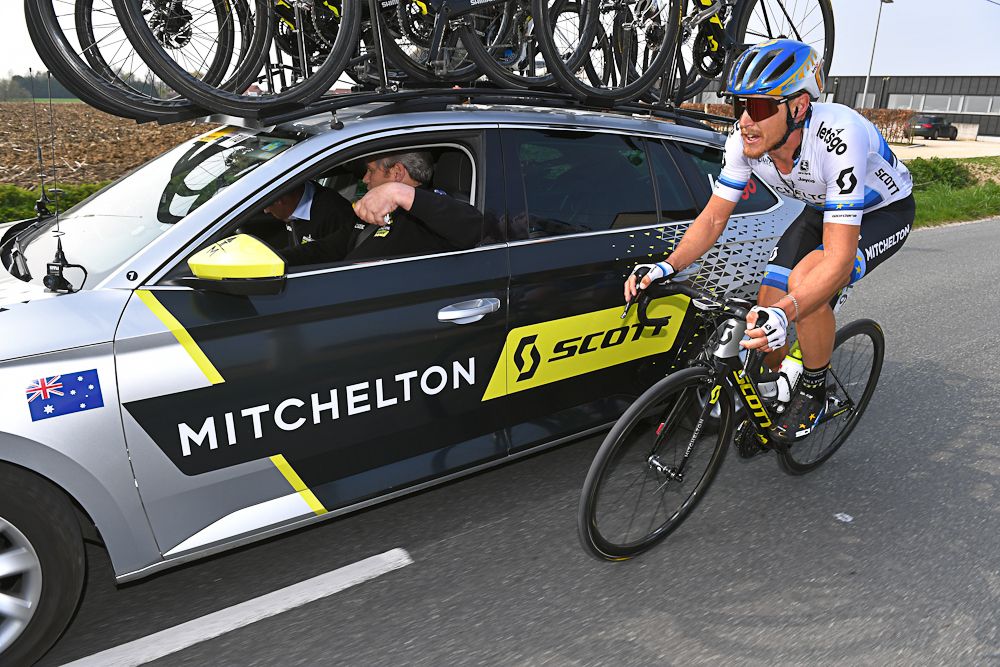 Matteo Trentin next to the team car at Gent-Wevelgeam