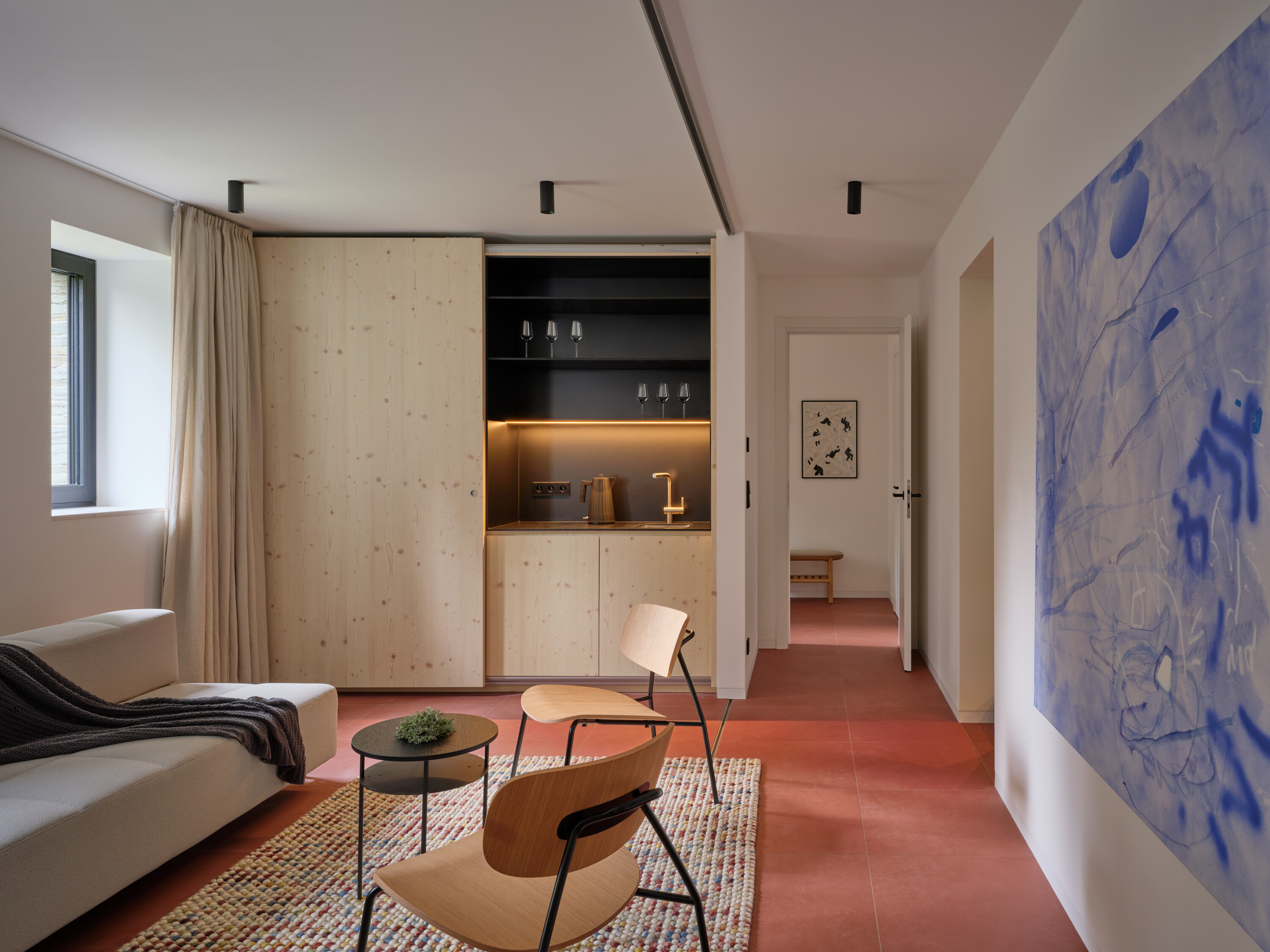 A second living room and utility areas are located on the ground floor